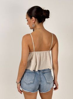 Crop top tachas beige