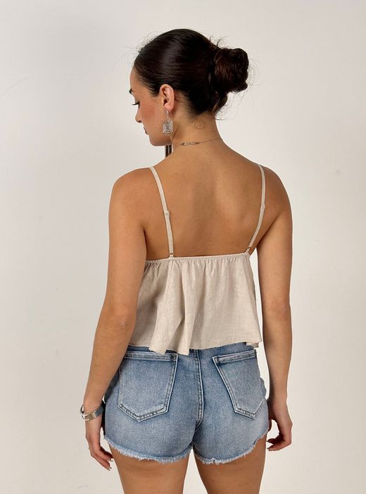 Crop top tachas beige