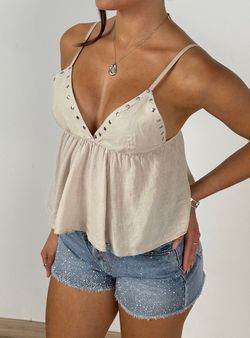 Crop top tachas beige