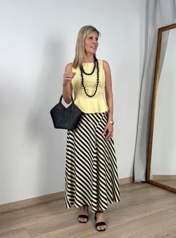 Top sin mangas Peplum amarillo