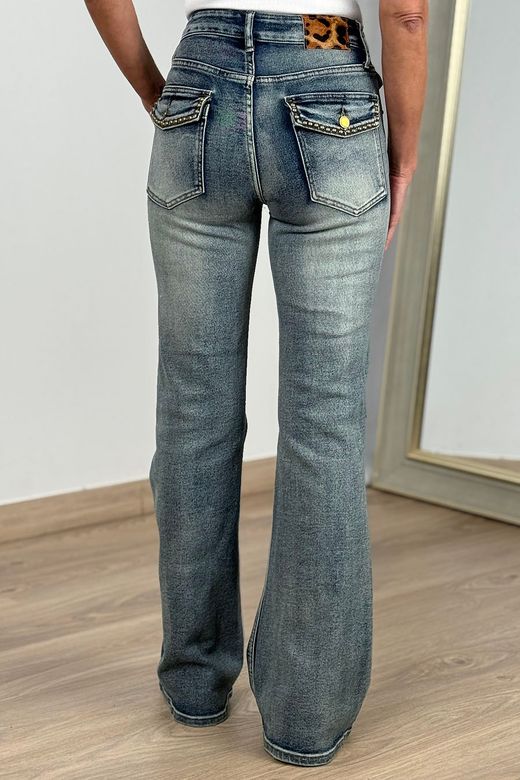 Vaqueros campana solapas azul delavado