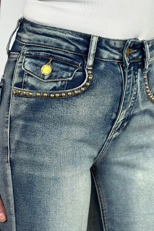 Vaqueros campana solapas azul delavado